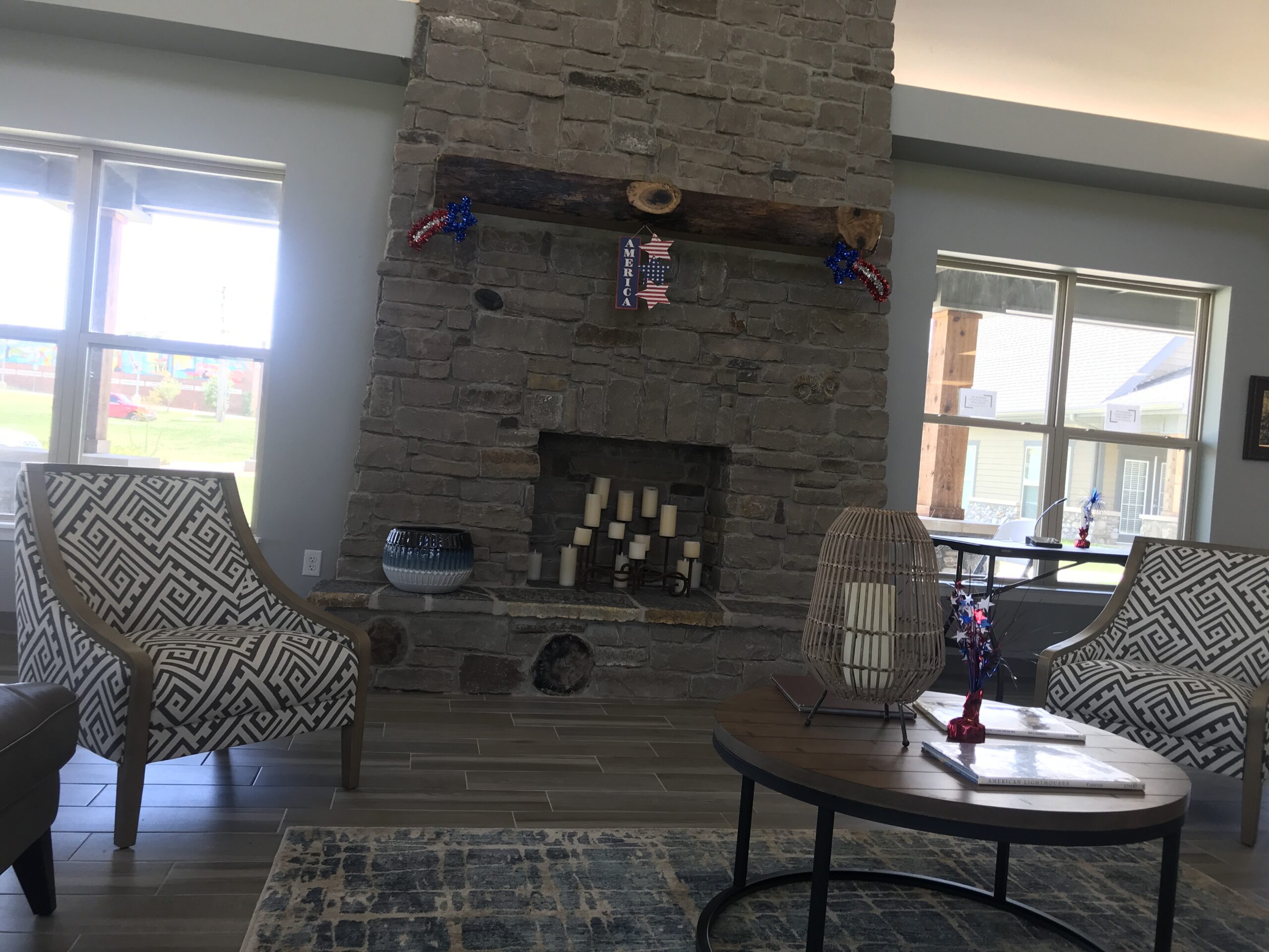 Sitting area with fireplace, decorated for the 4th of July