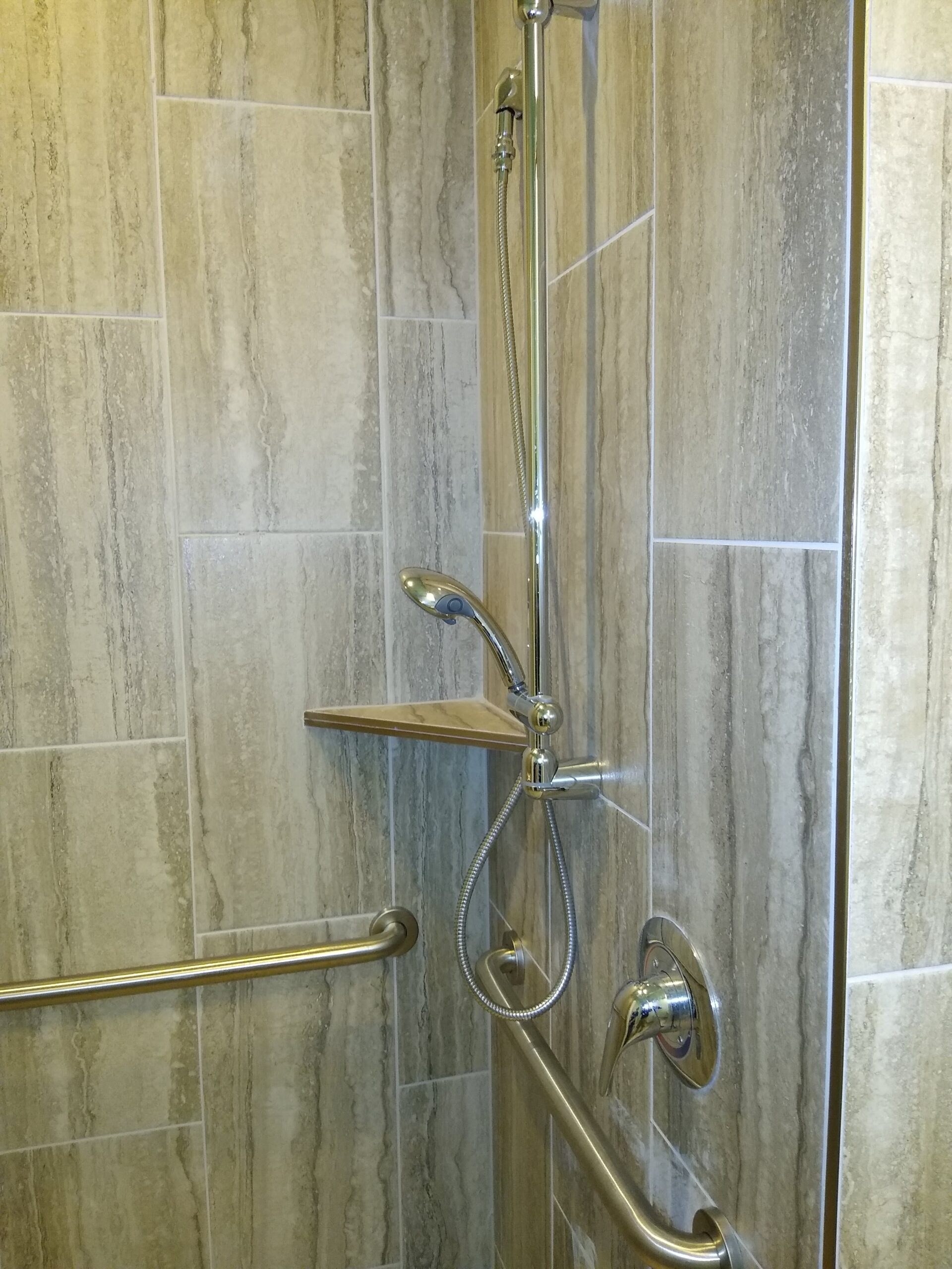 shower with detachable head and stability bars